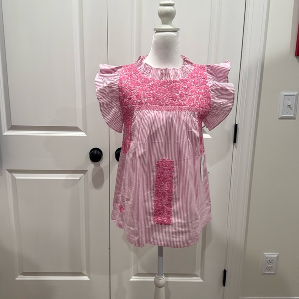 j.Marie lined top. Item is true to size.